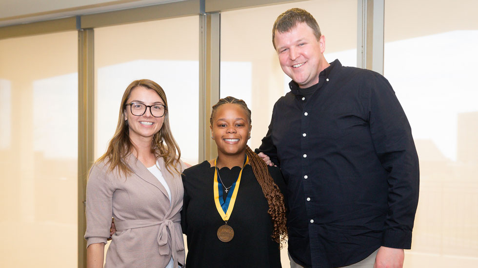 Naya Russell-Coprich with Victoria Terranova and Kyle Ward, associate professors in the Department of Criminology and Criminal Justice.