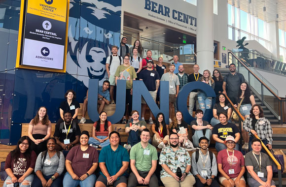 Group photo of graduate students in the Campus Commons.