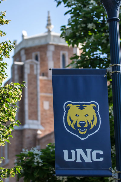 UNC Flag outside of Gunter Hall