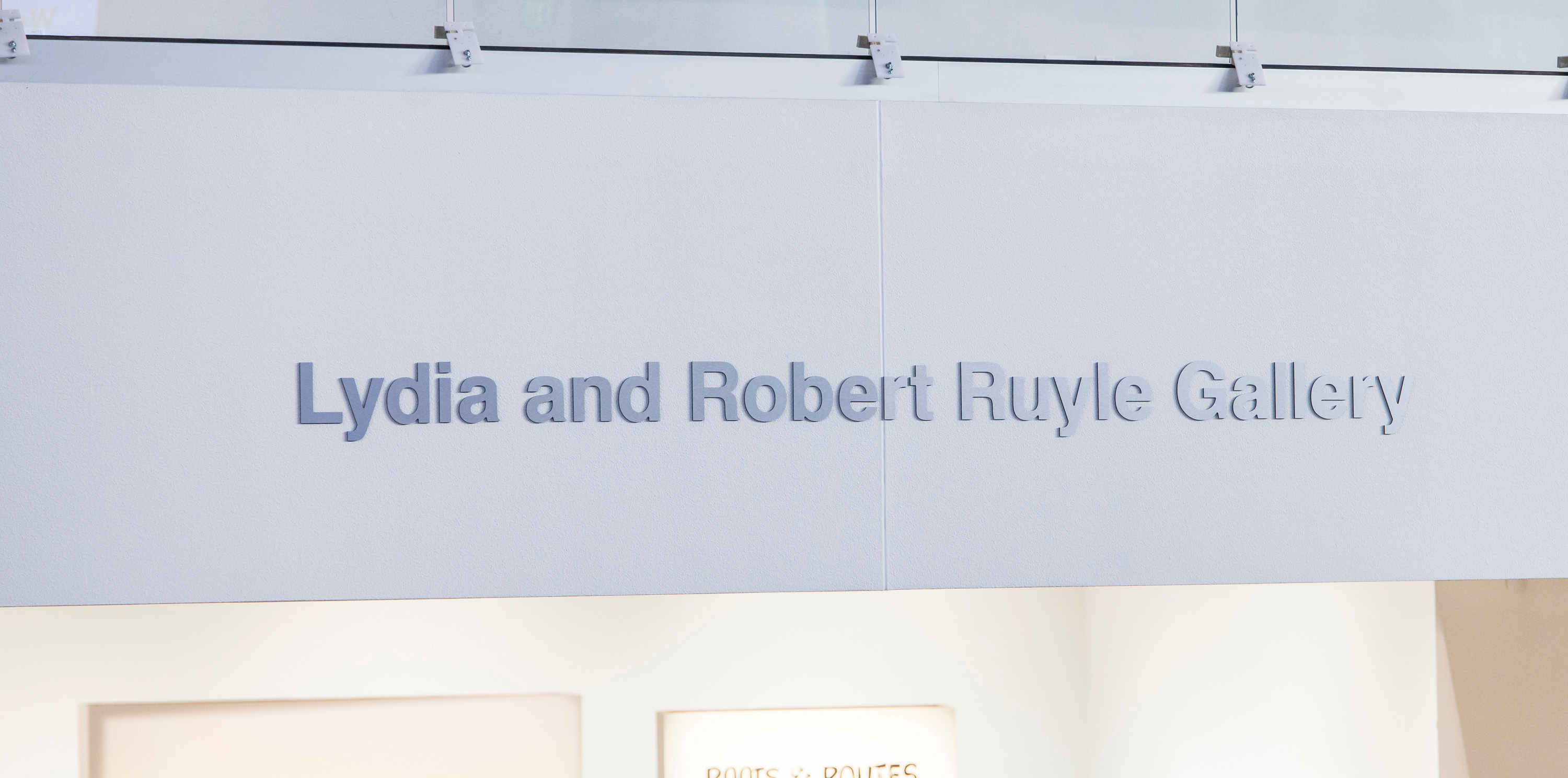 The name Lydia and Robert Ruyle Gallery on a wall