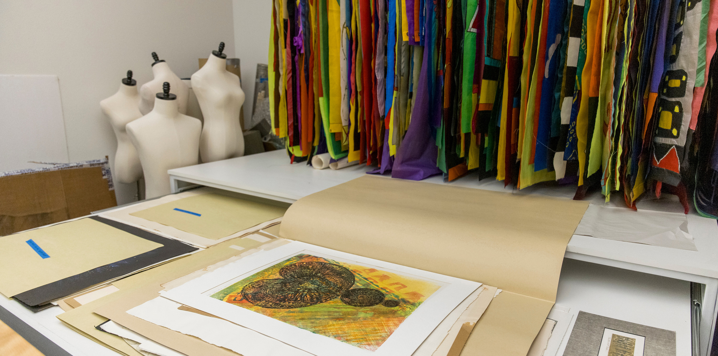 Artwork of Lydia Ruyle's displayed on a table