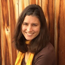 Sarah Campbell looking forward and smiling.