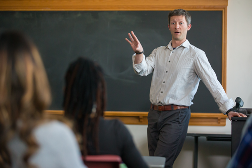 Instructor at front of classroom