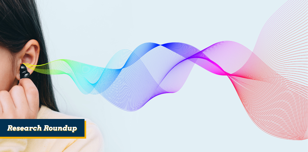 A human ear with colorful sound waves flowing out of it.